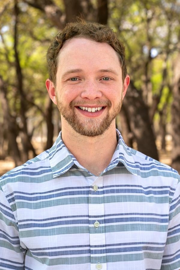 Matthew Pickard, leading worship and music at Coggin Church